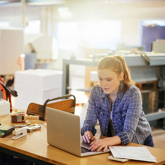woman working on a laptop